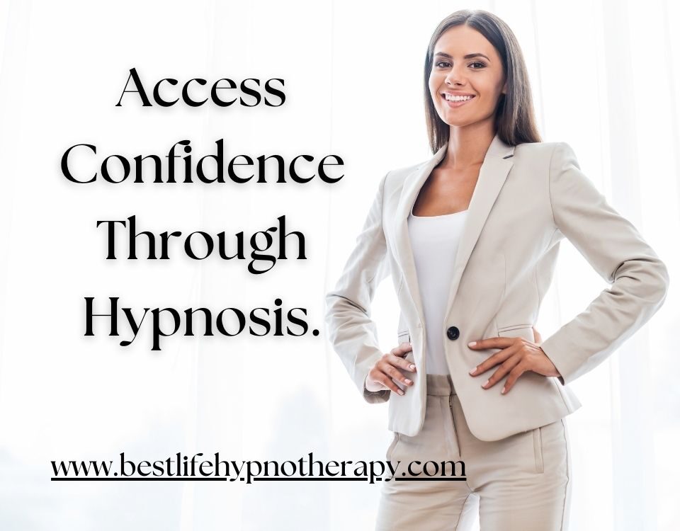 confident-woman-in-business-suit-blog-title-Access-Confidence-Through-Hypnosis-website-960-x-750