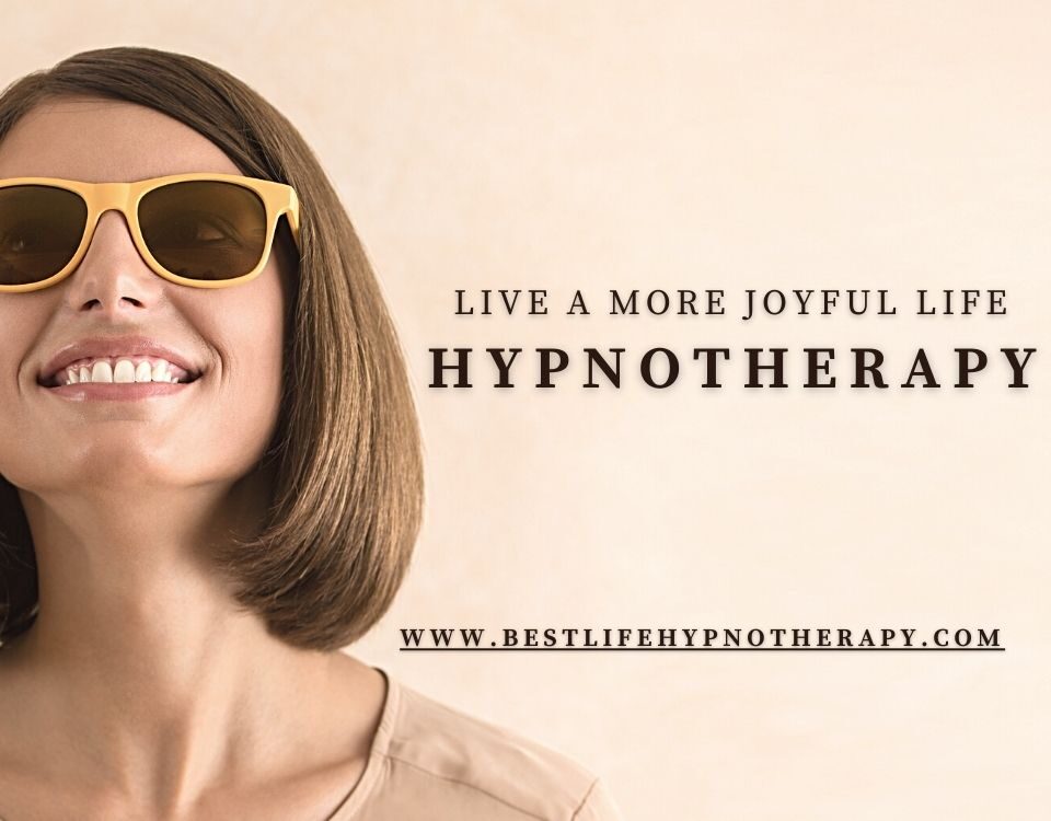 joyful-woman-with-sunglasses-blog-title-Live-a-More-Joyful-Life-With-Hypnotherapy